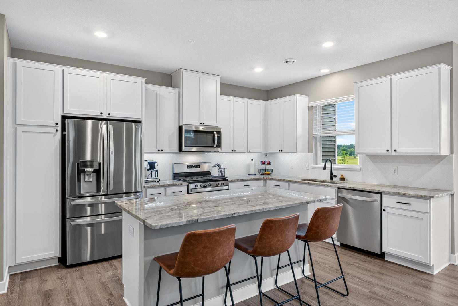 A white kitchen photographed for a listing